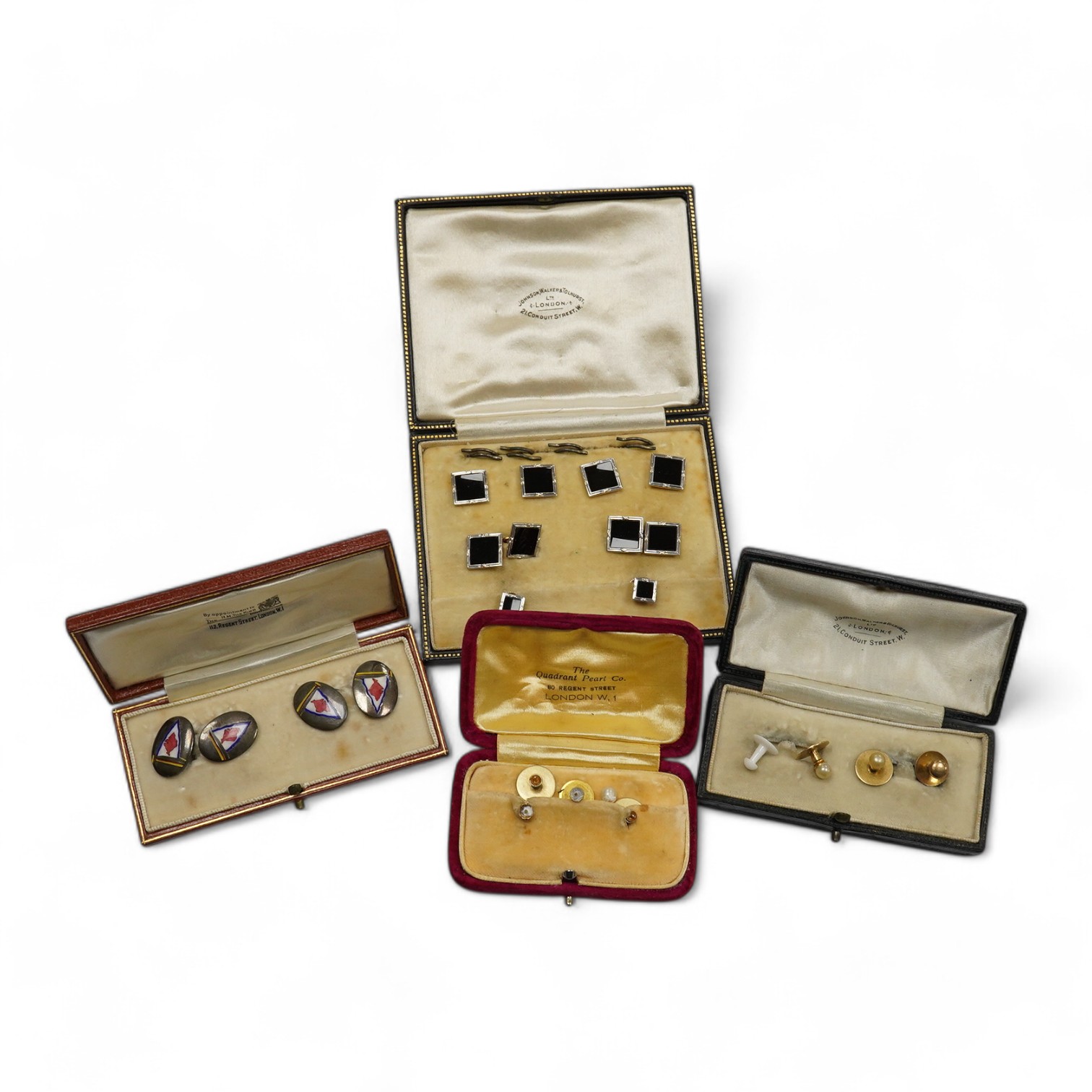 A cased pair of mid 20th century white metal and polychrome enamel oval cufflinks, by Benzies of Cowes, decorated with a pennant, together with five 9ct dress studs and a cased eight piece 9ct and enamel dress stud set.